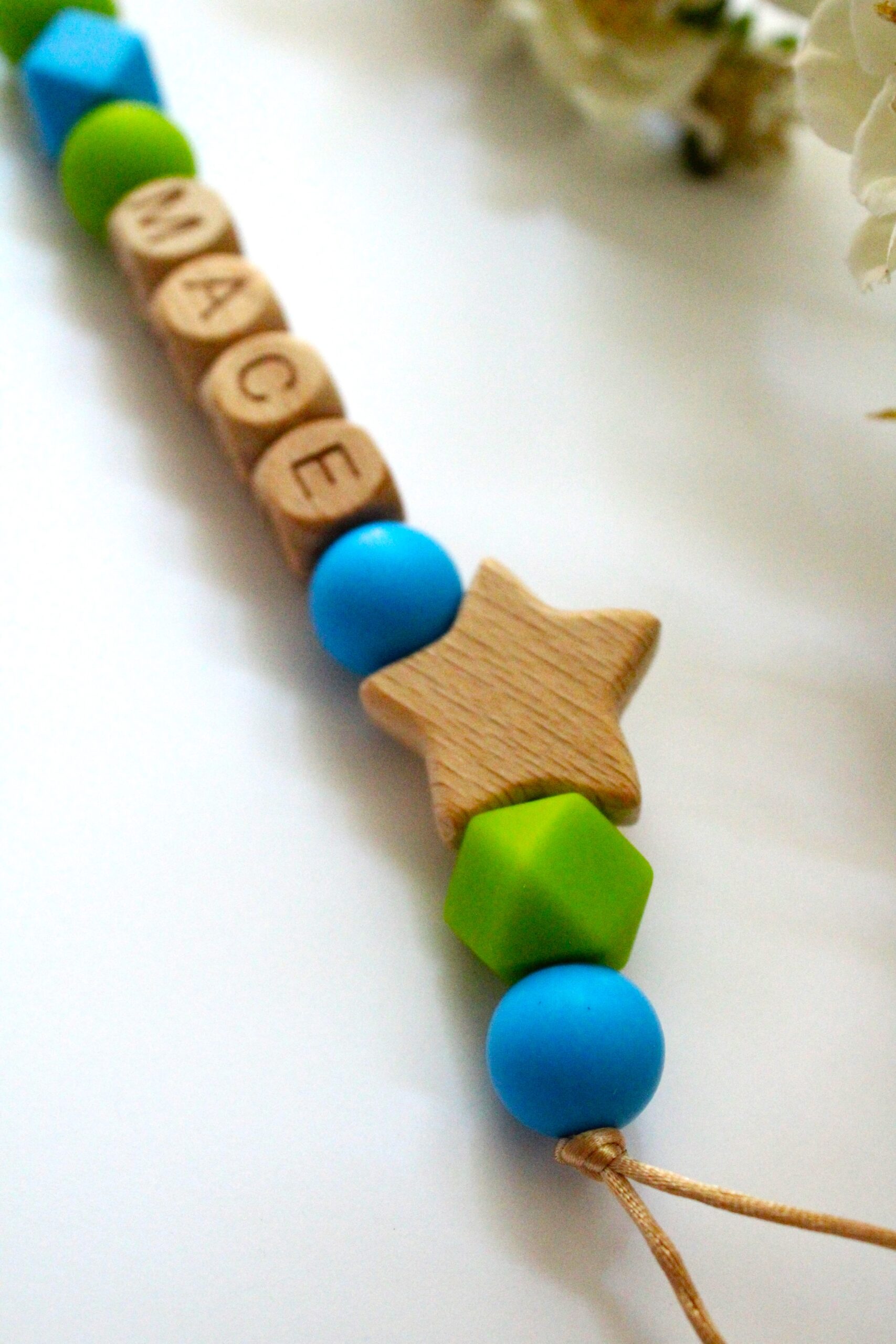 speenkoord met naam blauw groen ster